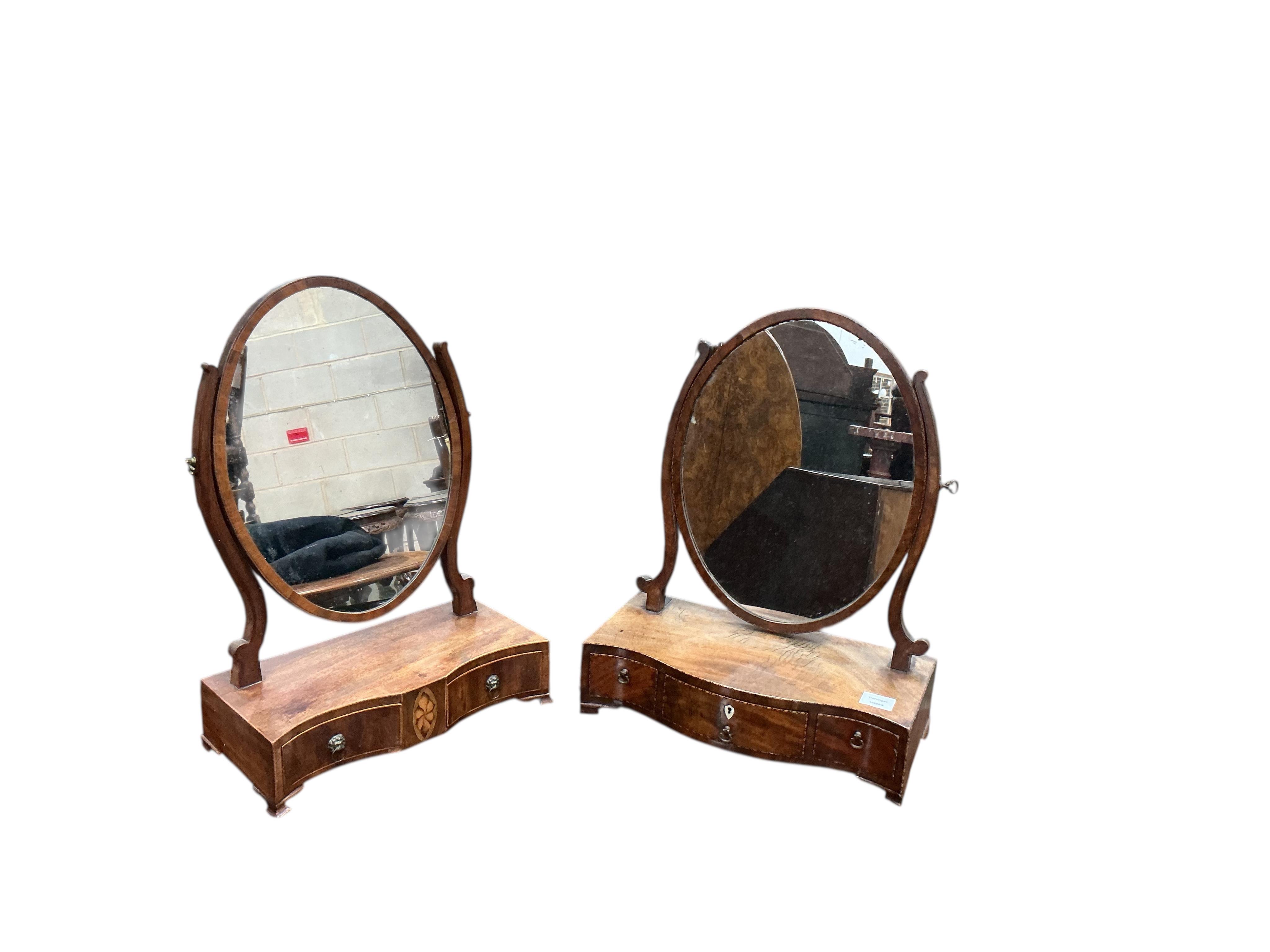 A George III toilet mirror in oval boxwood inlaid mahogany frame and one other, larger width 45cm, height 56cm
